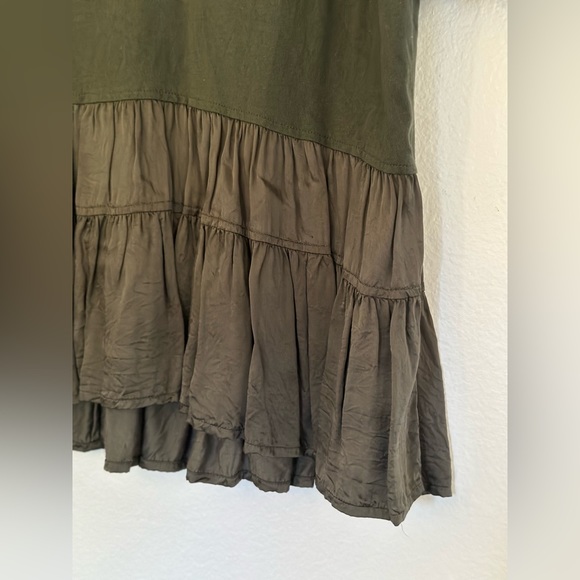 Green peplum top with satin ruffled bottom. Really cute and very comfy. - Picture 4 of 5